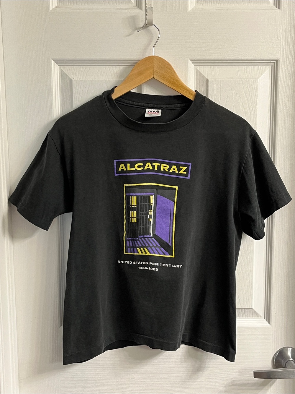 Vintage 1990’s Anvil Black Alcatraz Graphic Tee with Purple & Yellow Artwork